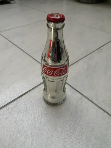 Garrafa da Coca Cola prateada
