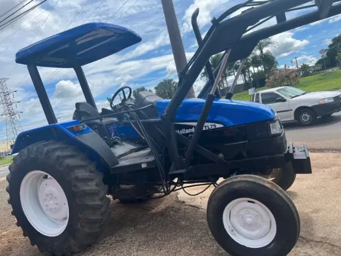 Trator revisado com pa tl75 troco por carro/caminhao