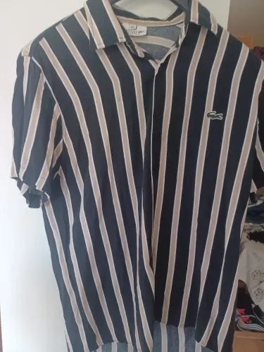 Camisa lacoste listrada nova tamanho L mas veste bem M