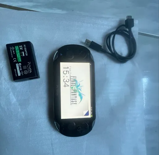 PS Vita OLED Desbloqueado + Carregador + Cartão Original Sony 4 GB