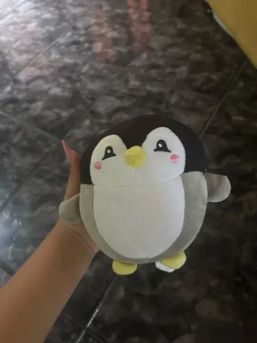 vendendo pelúcia pinguim
