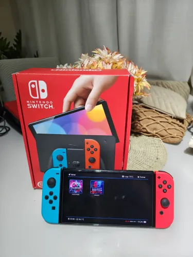 Nintendo switch OLED neon d.e.s.t.r.a.v.a.d.o aceito cartão e trocas