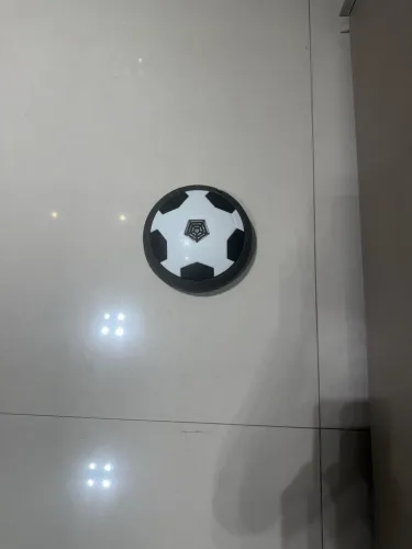 Bolinha de futebol que desliza no chão