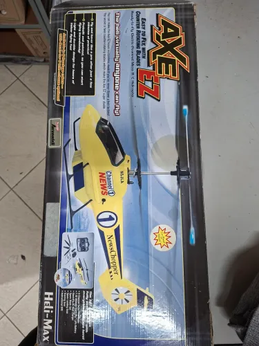 Helicóptero AxeE2 com controle e completo. Perfeito para colecionadores!