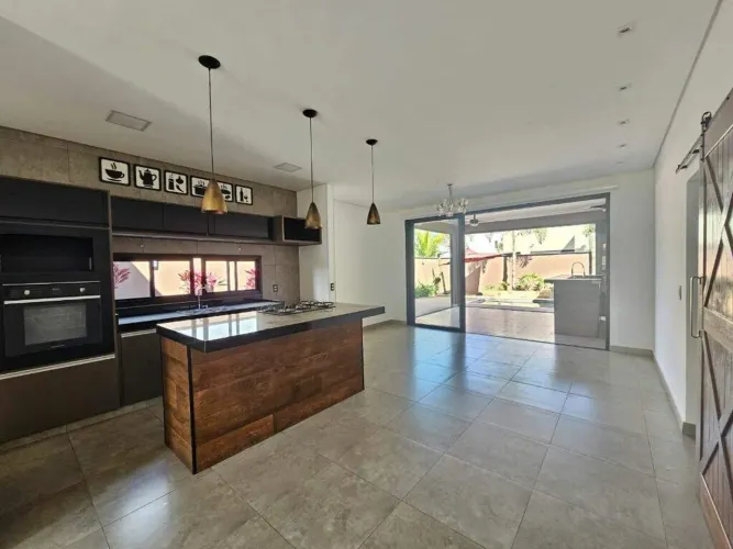 Casa com 3 dormitórios para alugar, 198 m² por R$ 8.570,00/mês - Residencial Terras de Árt