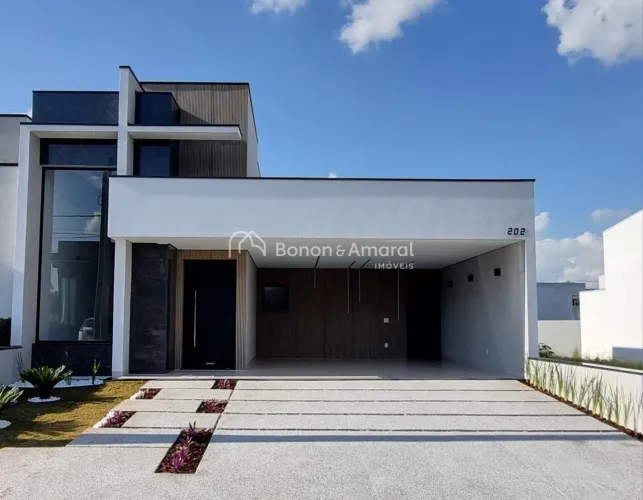 Casa à venda no condomínio Campos do Conde 2 em Paulínia, com 3 suítes e piscina.