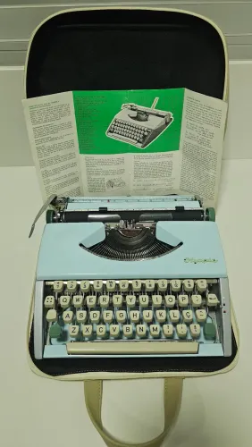 Maquina de escrever Olympia Cursiva