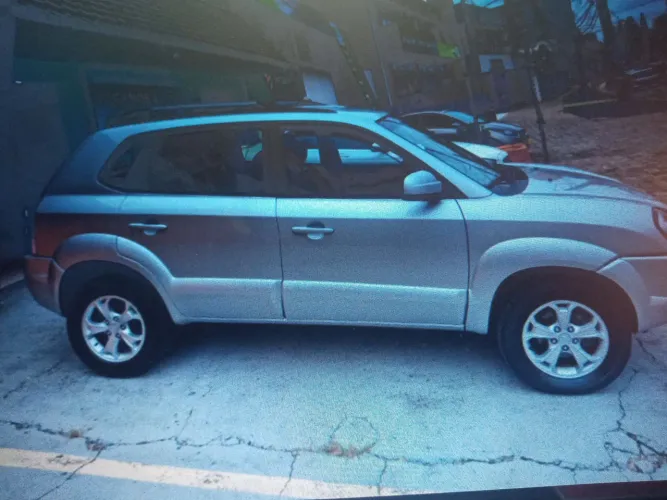 Vendo linda tucson 2010. 33.00 ac. Troca por imovel ou terreno e cartao