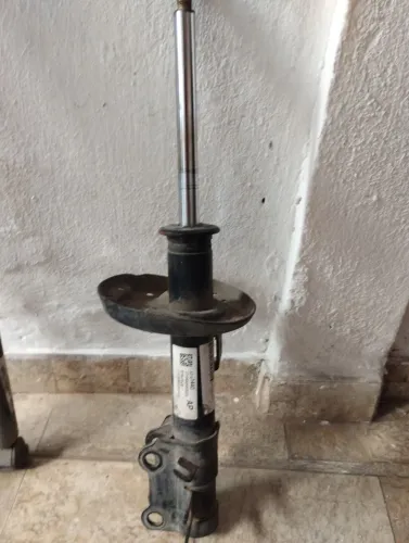 Amortecedor dianteiro esquerdo Onix