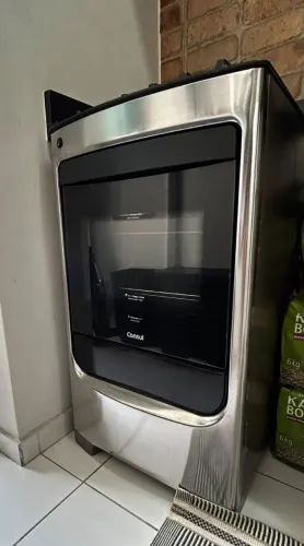 Fogão Consul 4 bocas cor Inox com mesa de vidro e grade de ferro fundido BIVOLT
