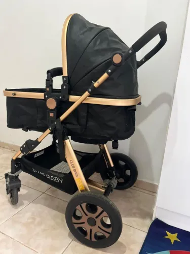 Carrinho de bebê + bebê conforto+ brindes