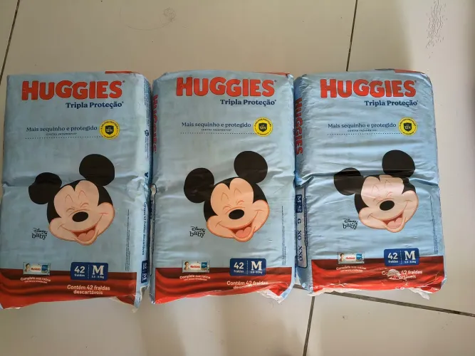 FRALDAS HUGGIES TAM. M - 42 UNI. CADA PACOTE