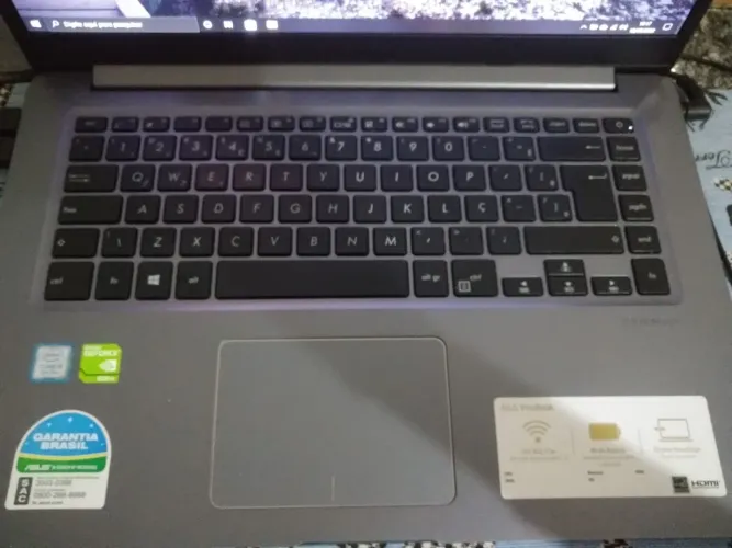 Vendo notebook da asus com a caixa dele acompanha um controle de vídeo game