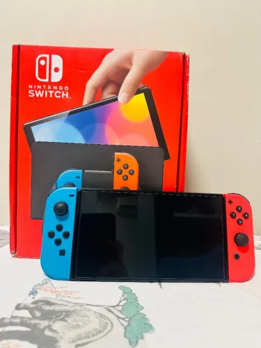 Nintendo Switch OLED Neon 64GB + Kit de proteção 