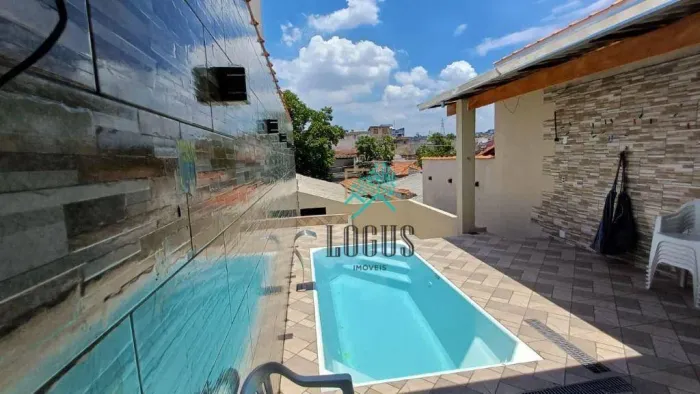 Casa com piscina , varanda gourmet e 2 dormitórios à venda, 180 m² por R$ 595.000 - Vila L