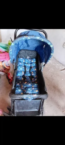 Carrinho de bebê e Berço 