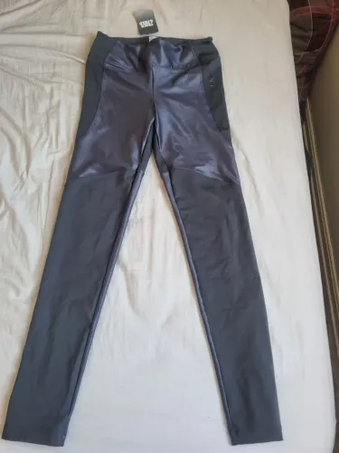 Legging recortes nova track field, p