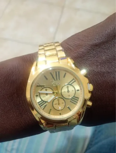 Relogio unissex dourado novo