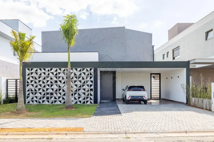 Casa com 4 suítes e lazer completo com piscina e fire pit no Arborais