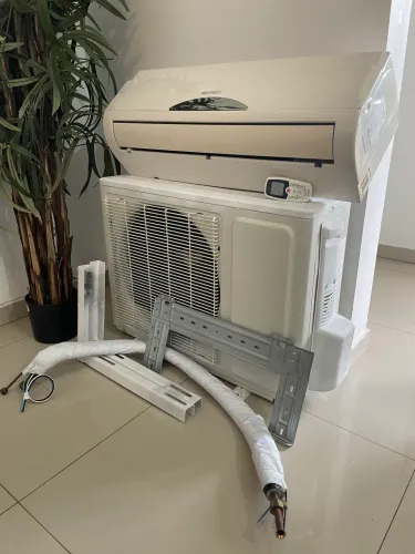 VENDE-SE AR-CONDICIONADO 12.000 BTUs QUENTE E FRIO - COM INSTALAÇÃO INCLUSA!