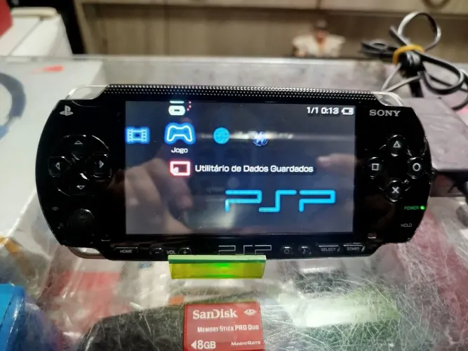 Psp fat cartão 8gb c jogos carregador original bom estado ac trocas 