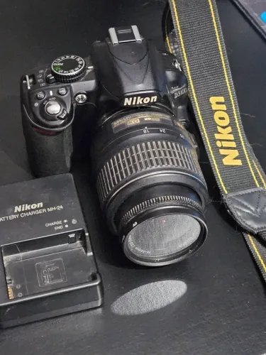 Nikon D3100 + Lente AF-S DX 18-55mm VR + Carregador Original