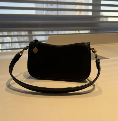 bolsa preta swinger 20 coach