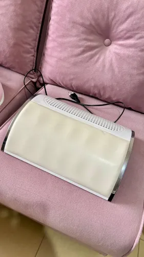 Apoio de mão com sugador