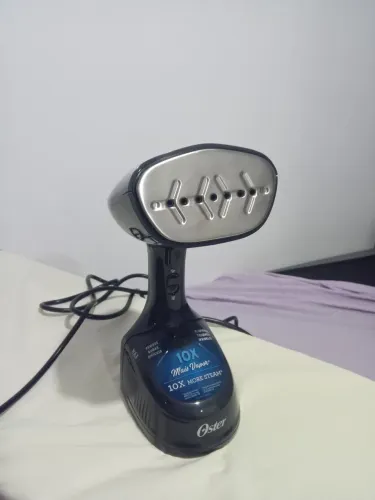 vaporizador portátil de roupas da marca Oster (ferro de passar à vapor)