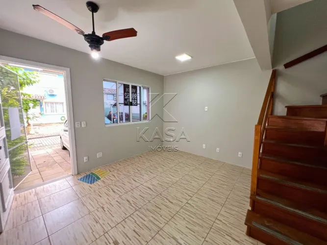 Casa à venda no condomínio Jardim Tulipas, bairro Humaitá, Porto Alegre, com 3 dormitórios