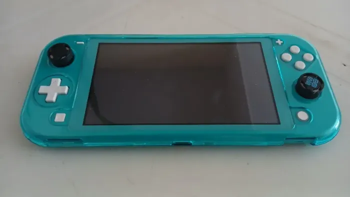 Nintendo Switch Lite - Seminovo / Caixa / Acompanha 2 jogos originais e acessórios