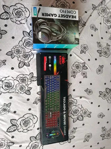 Teclado e fone novos
