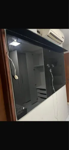 Painel de TV de vidro preto