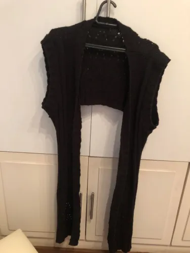Bolero feminino de tricô preto