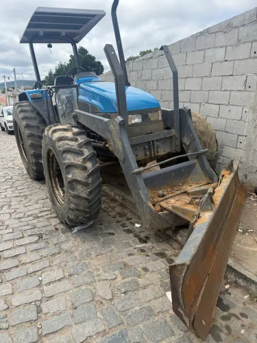 Vendo ou troco trator new rolad 2003 lamina tatu