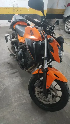 Moto nova relação e pneus zero