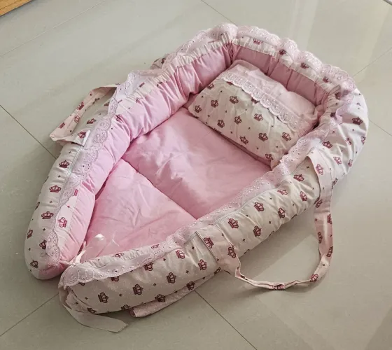 Ninho redutor de berço rosa com travesseiro