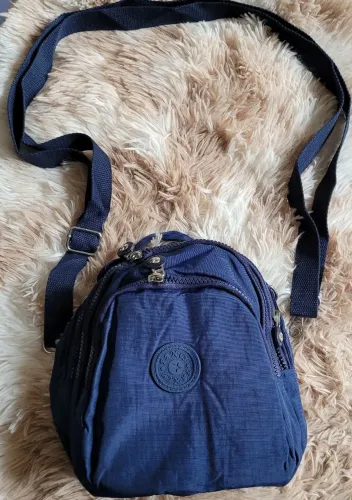 Bolsa azul impermeável pequena nova mochilinha