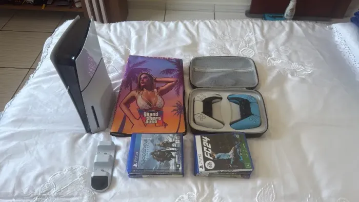 PlayStation 5 completo com 6jogos , dois controles , carregador duplo e capa .
