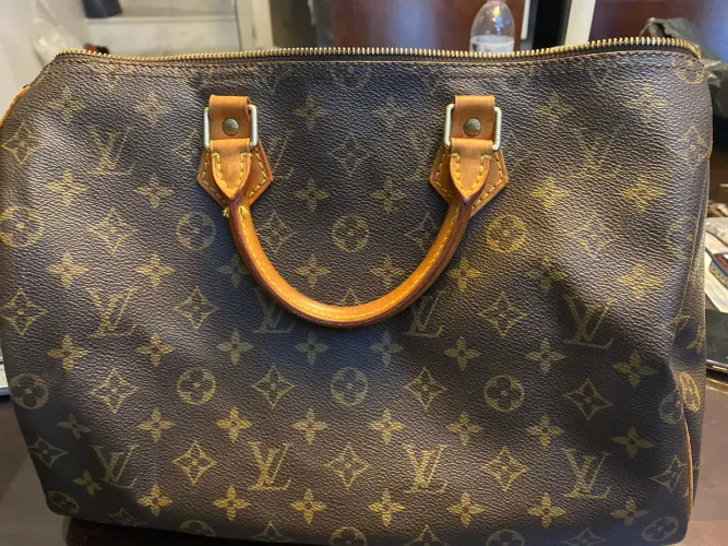 Louis Vitton Speedy 35 original muito conservada com cadeado .