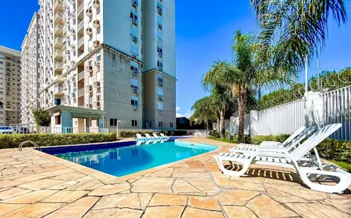 Apartamento com 2 dormitórios para alugar, 56 m² por R$ 2.650,00/ano - São Sebastião - Por