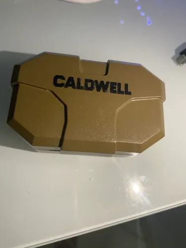 Abafador tático e fone bluetooth caldwell