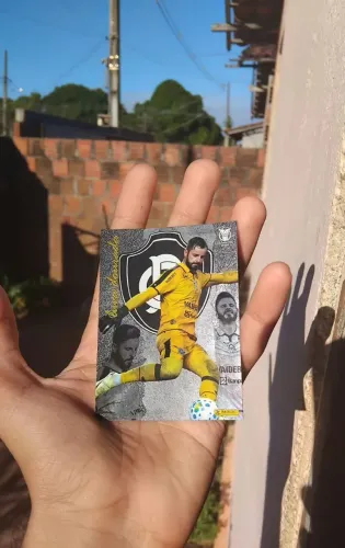 Card Panini Brasileirão 2026 - Marcelo Rangel D08 - Luva Dourada ?