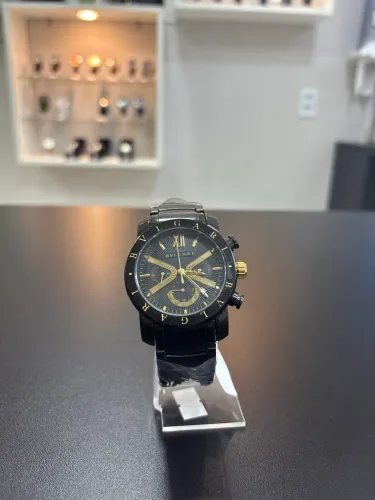 Relógio Bvlgari - preto com detalhes amarelo