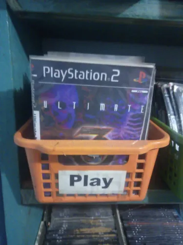 Cesta com jogos de play 2