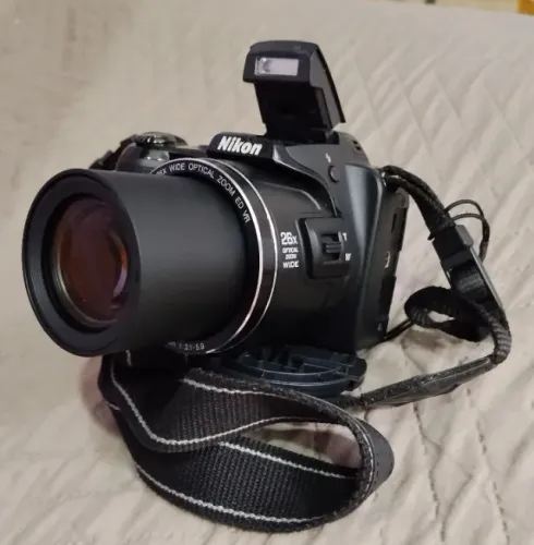 Nikon Cooldpix L810 Semi Nova com Case Logic e Carregador de pilhas.
