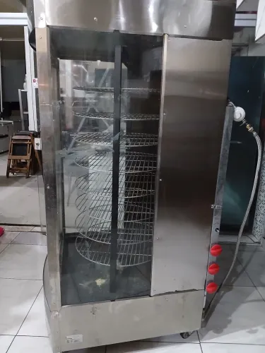 Maquina giratória de assar progas