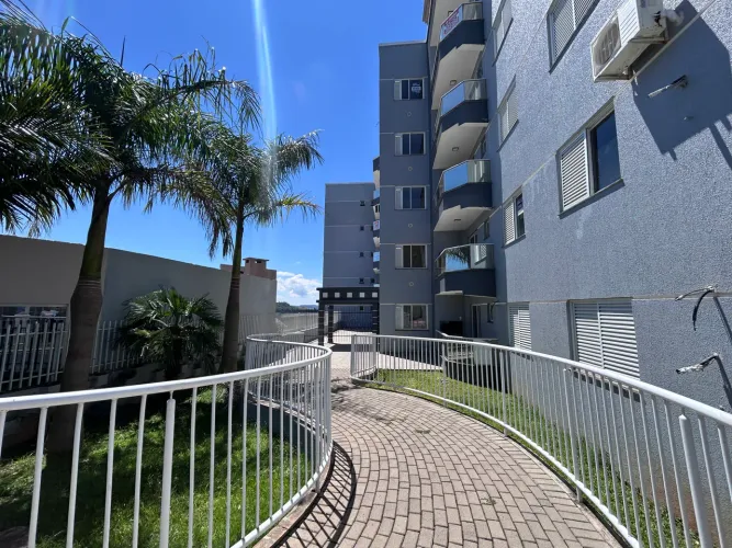 Apartamento novo, suíte + 2 + 3 vagas de garagem!