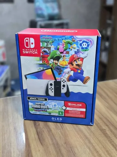 Nintendo Switch OLED 64GB + Super Mario Bros Wonder (Lacrado )