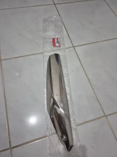 Proteção descarga titan 24 original Honda